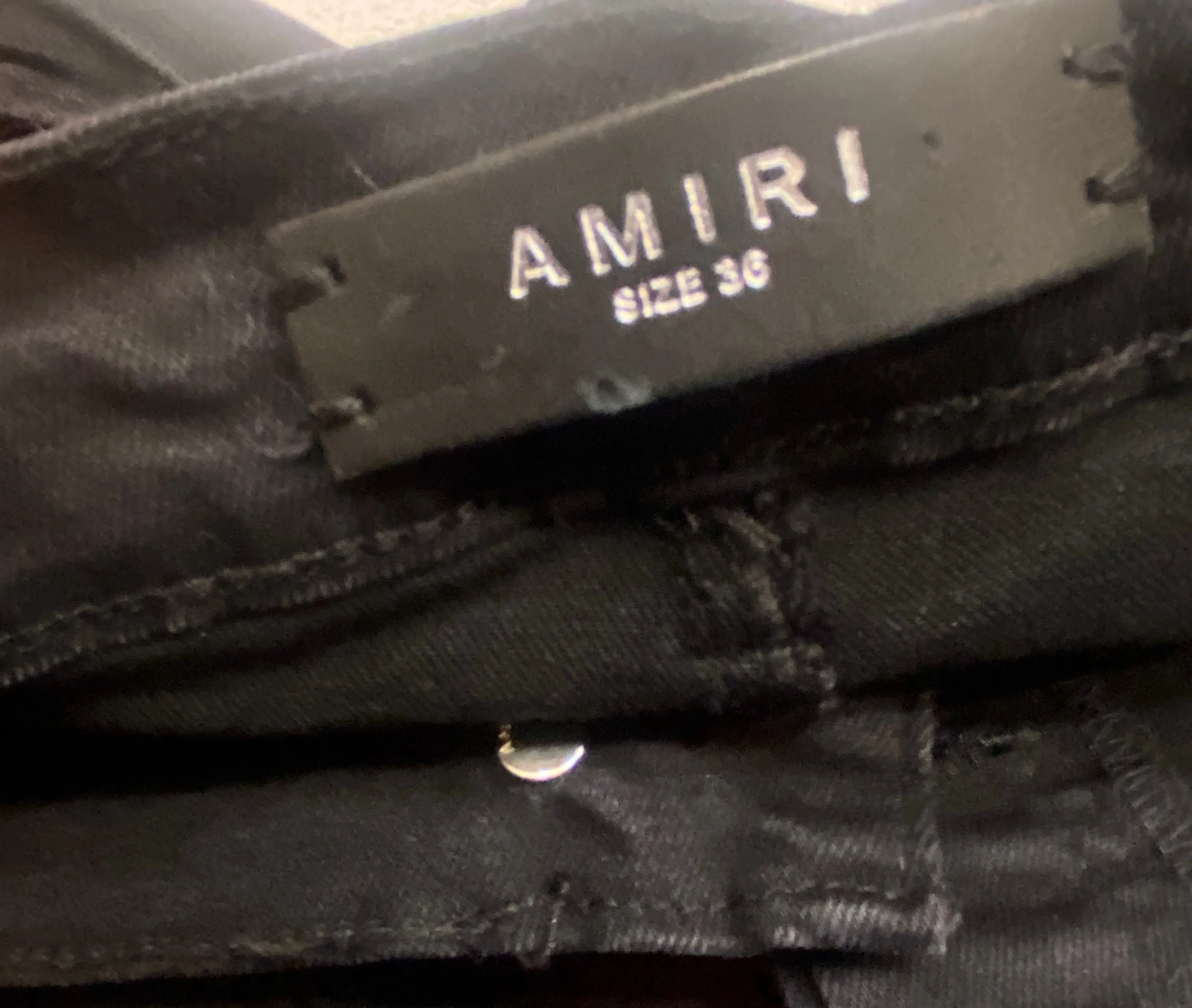 AMIRI DISTRESSED DENIM JEANS