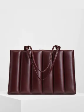 Drive bag in oxblood leather
